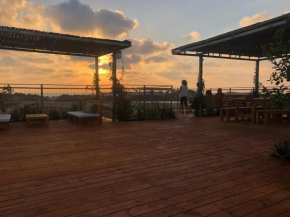 Rooftop camping, in front the Mediterranean Sea, facing the Carmel mounts
